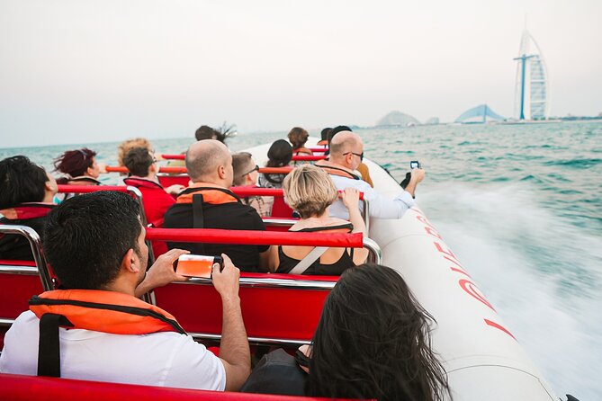90 Mins Speedboat Tour Dubai Marina JBR Atlantis and Burj Al Arab - Jumeirah Beach Views: The Public Beach Scene Behind the Luxury Frontages