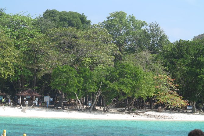 A full Day Haa & Rok islands from Koh Lanta( By Speed Boat) - Koh Haa final stop: limestone cliffs, clear water, and jellyfish risk