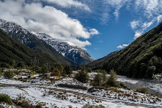 Arthur’s Pass Tour From Christchurch With Jet Boat & TranzAlpine - Lake Lyndon at Porters Pass: a quick cold-water pause