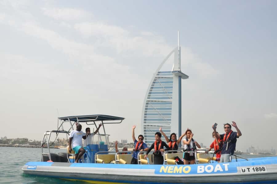 Dubai: Guided Speedboat Tour with City Sights & Ice Cream. - Burj Khalifa from the sea: the return route surprise