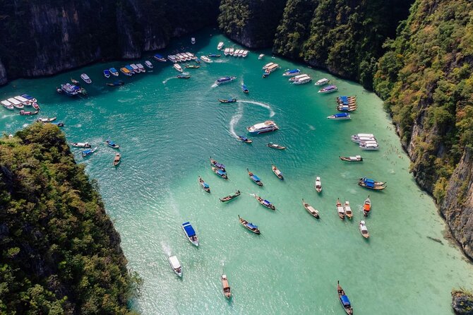 Early Bird Phi Phi 4 Islands by Speedboat 2 Trips in 1 Day - Getting to the pier from Krabi: pickup, minibus, and boat capacity