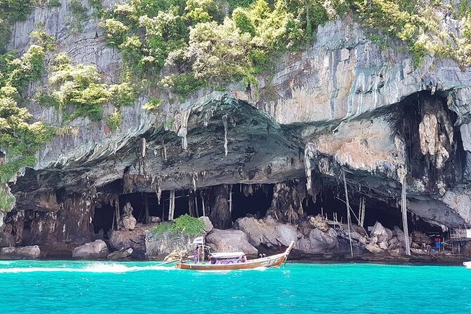 Early Bird Phi Phi 4 Islands by Speedboat 2 Trips in 1 Day - Maya Bay: 50 minutes for sand, photos, and a breather