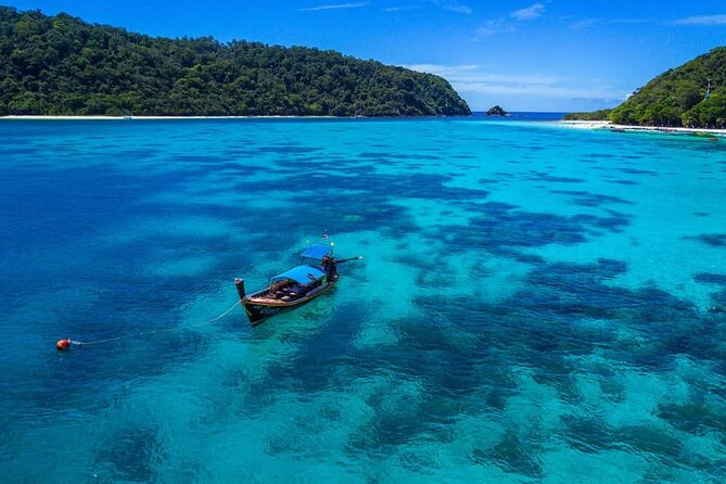 Early bird Phi Phi islands and 4 Islands by Speedboat Tour - Chicken Island and the classic sandbank walk