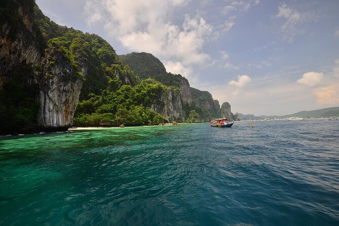 Early Bird Phi Phi Islands Tour From Phi Phi by Speedboat - Pi Leh Bay and Pi Leh Lagoon: swimming and snorkeling on limestone