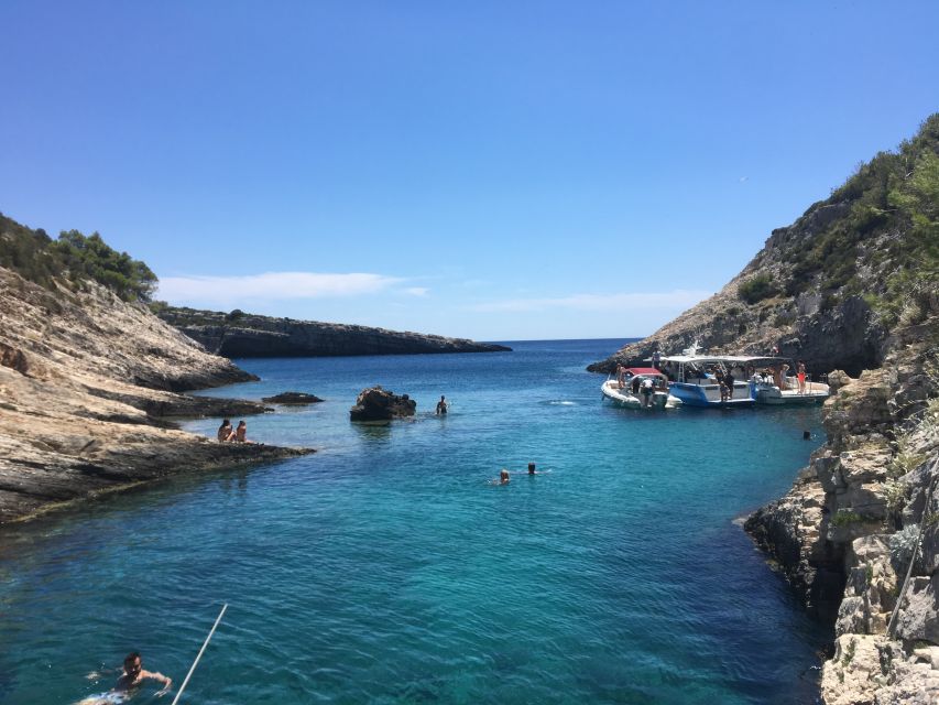 From Hvar: Blue Cave, Green Cave & 5 Islands Speedboat Tour - Speedboat comfort: life jackets, jackets, and the sea-bounce truth