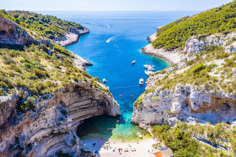 From Hvar: Blue Cave, Green Cave & 5 Islands Speedboat Tour - Stiniva Cove on Vis: Europe’s famous beach angle