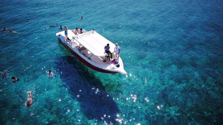 From Hvar: Vis Island and Blue Cave Speedboat Tour - Stiniva Beach: the swim stop with big cliff drama