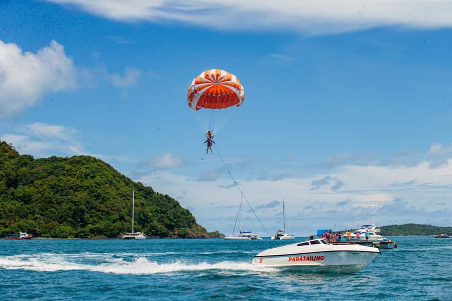 From Phuket: Coral Island Kahung Beach Speedboat Trip - How the day flows: pickup, pier, then Kahung Beach by lunchtime