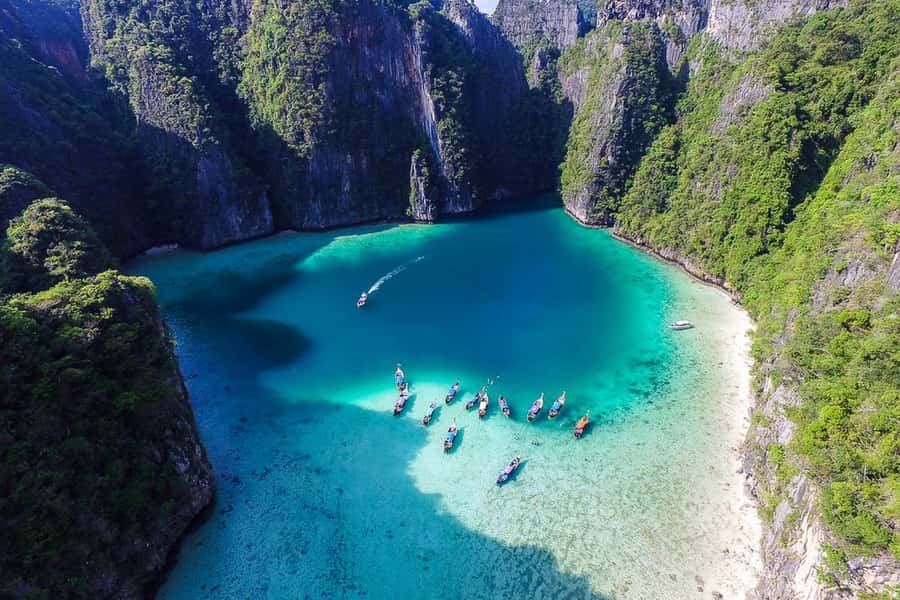 From Phuket: Phi Phi Island Private Full-Day Speedboat Trip - Phi Phi Lae and Viking Cave: scenery with a story-shaped stop
