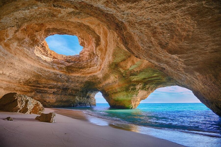 From Portimão: Benagil Caves Guided Speedboat Tour - The low speedboat ride: wind, straddling, and live commentary