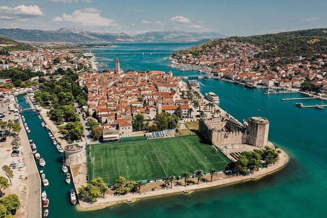 From Split: Blue Lagoon and 3 Islands Speedboat Tour - Stop 3: Trogir, the Stone Beauty, for walking and a real meal