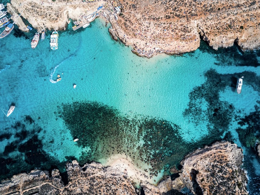 From St. Julian's: Comino and Blue Lagoon Trip by Speedboat - Blue Lagoon reality check: crowds, deck chairs, toilets, and extras