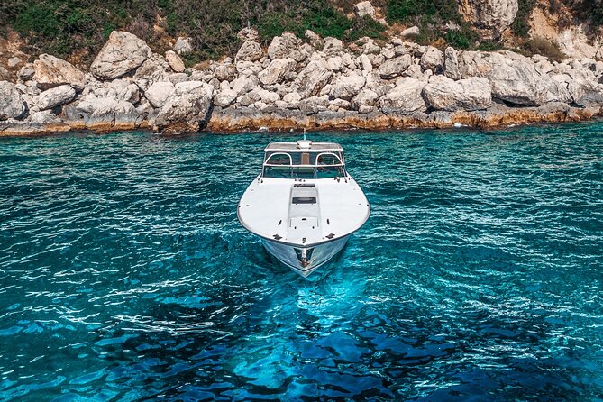 Half day around Capri by Itama 38 speedboat - Stop 3: I Faraglioni (10 Minutes) — Capri’s Signature Rocks