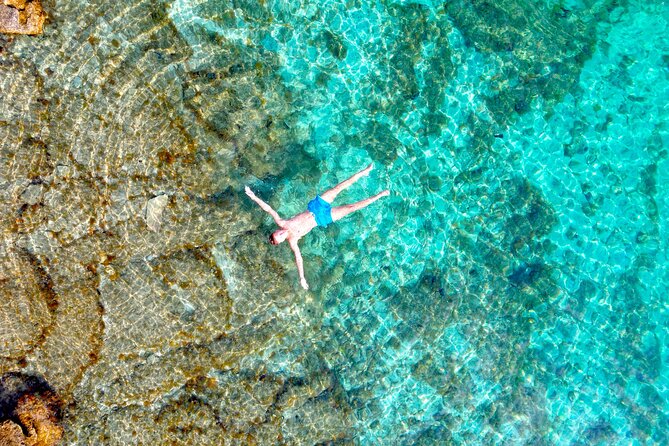 Half-day Speedboat Tour: Explore Hidden Gems of Hvar Island - Stop 4: Zečevo Islet and the Beach Bar Moment