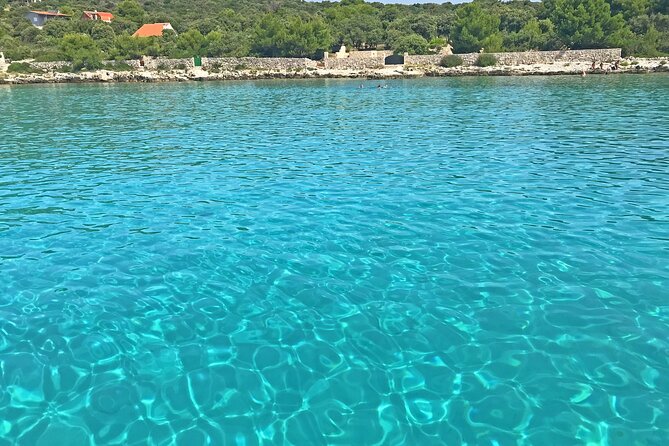 Half Day Speedboat Tour to Three Islands from Trogir - Stop 3: Ciovo and Duga Bay for Beach Time and Lunch