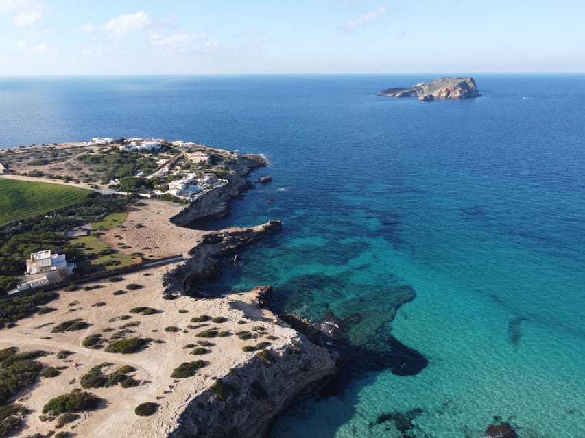 Ibiza: SpeedBoat trip to Atlantis & Es Vedra Snorkel+Paddle - Stop 1 and the Early Cruise: Settling In Near Cala Bassa Views