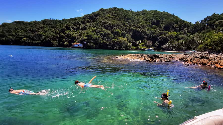 Ilha Grande: 6-Hour Speedboat Tour to Blue and Green Lagoons - Enseada das Estrelas: Beach Time, Photos, and Optional Brazilian Seafood Lunch