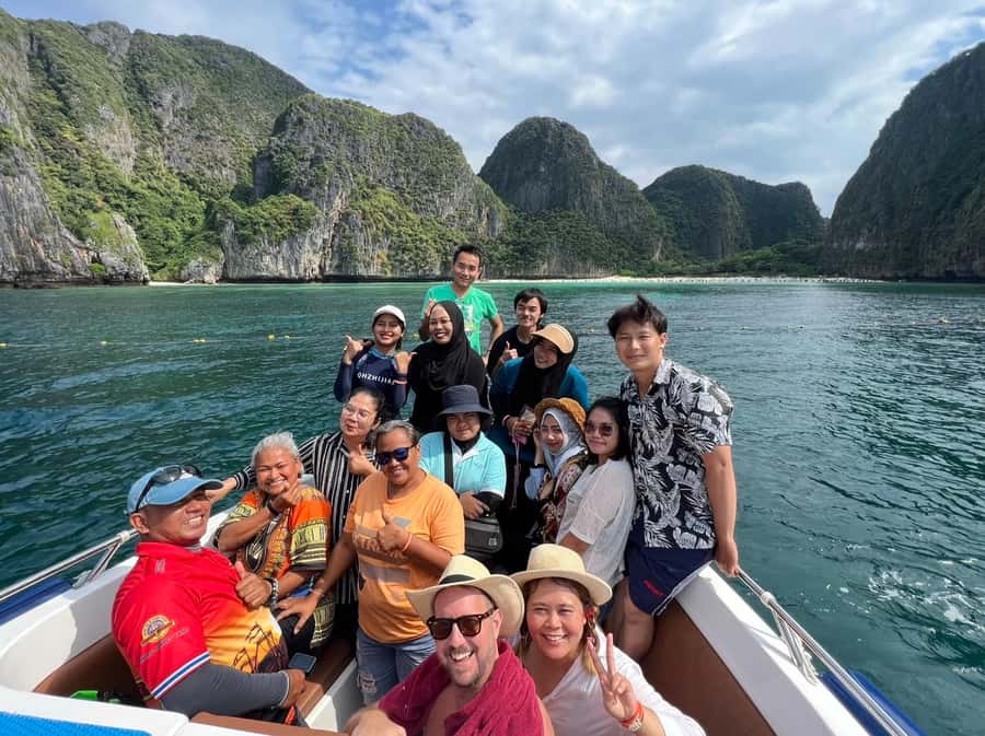 Krabi: Early Bird Phi Phi, Maya & 4 Islands Speedboat Tour - Pileh Lagoon: swimming and snorkeling in a natural limestone pool