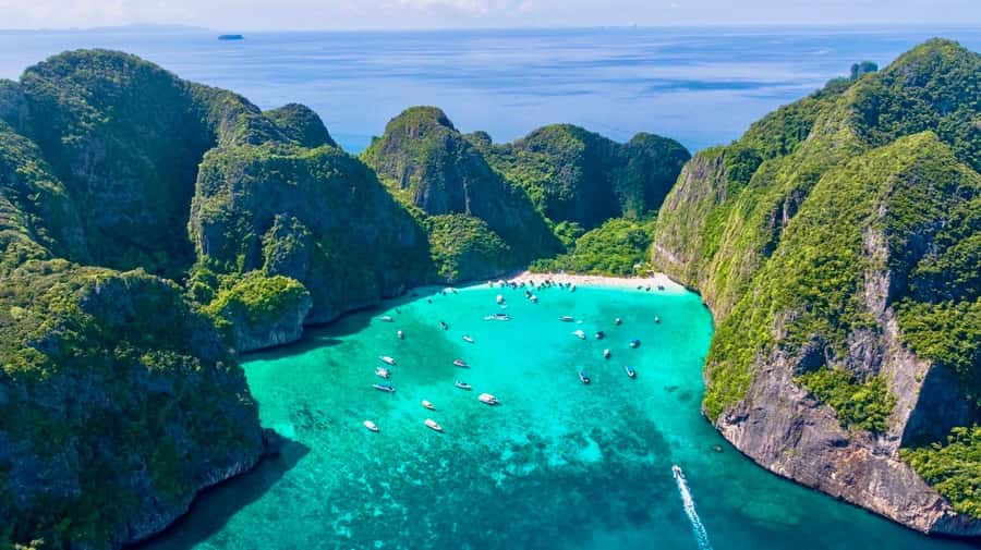 Krabi: Phi Phi & 4 Islands Sunset Tour by Speedboat - Getting on the speedboat from Ao Nang (and other pickup zones)