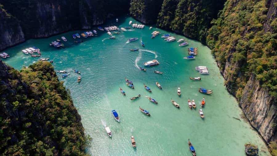 Krabi: Phi Phi Early Bird & 4 Island by Speedboat with Lunch - Getting to the action fast: Railay East Floating Pier and the speedboat ride
