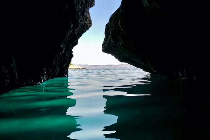 Makarska: 3-Island Speedboat Tour with Cave and Blue Lagoon - Zečevo Blue Lagoon: snorkeling in clear water near an uninhabited islet