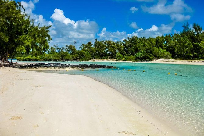 Marvelous Ile aux Cerf island: Speed Boat, Parasailing, Lunch & GRSE waterfall - Ile aux Cerfs beach time: swim, relax, and keep one eye on the clock