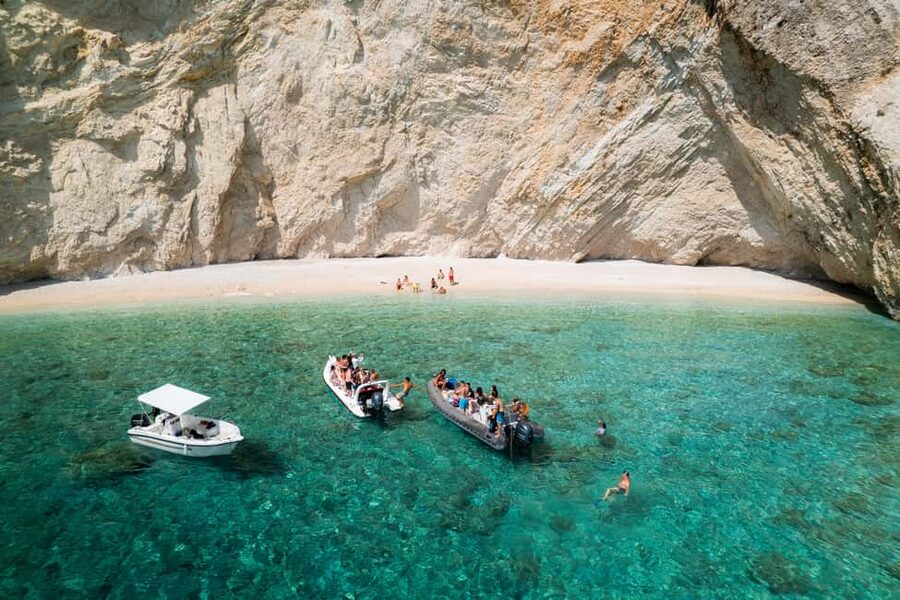 Palaiokastritsa: Coastline and Blue Caves Speedboat Tour - Giali Beach swim time: clear water and cliff-jump energy