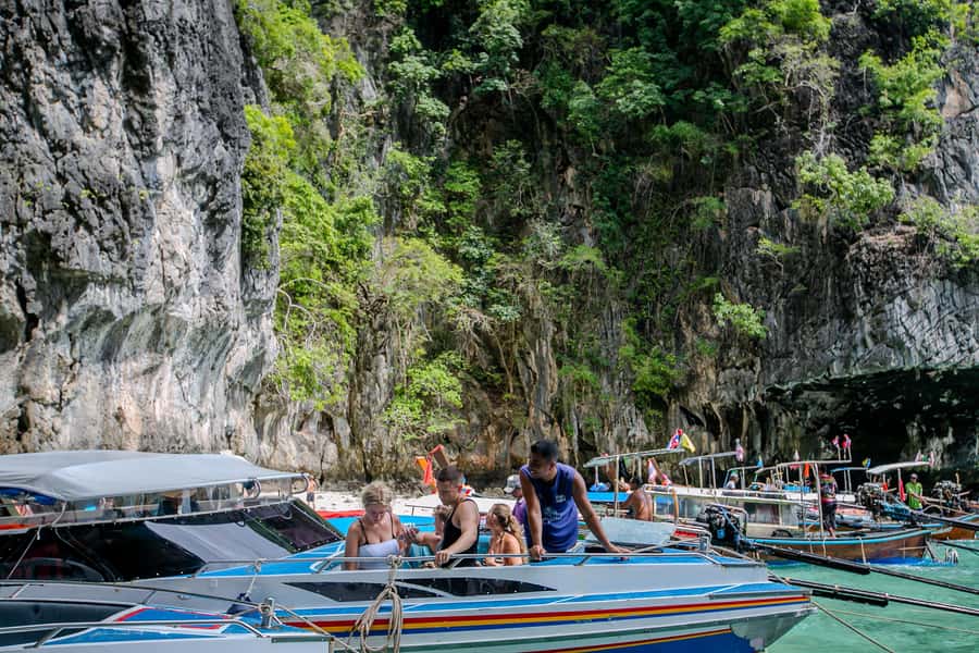 Phi Phi: 7 Islands Speed Boat Tour with Sunset and Plankton - Viking Cave and Pileh Lagoon: caves, quick stops, and real water time