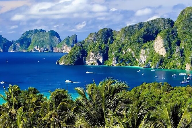 Phi Phi & Bamboo Islands Snorkeling Tour w/ Fins by Speedboat - Speedboat route and limestone views around Ko Phi Phi Lee