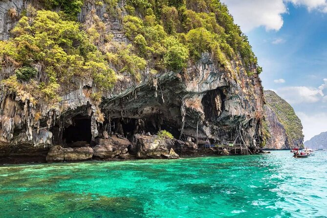 Phi Phi & Bamboo Islands Snorkeling Tour w/ Fins by Speedboat - Bamboo Island: calm beach time and the “walk through nature” moment