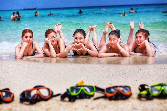 Phi Phi & Bamboo Islands Snorkeling Tour with Lunch by Speedboat - Viking Cave: the scenic cruise moment and snorkeling time