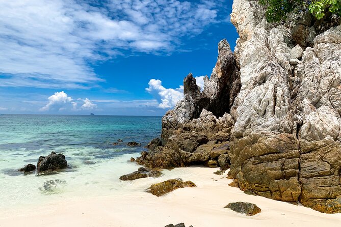 Phi Phi Islands & Maya Bay: Premium Service & All-Day Food - The Phi Phi coves: Pileh Bay and Loh Samah for dramatic views