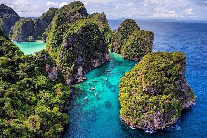 Phi Phi Islands: Maya & Khai Speedboat Experience - Pileh Bay: the swim break, paddle board option, and photo add-ons