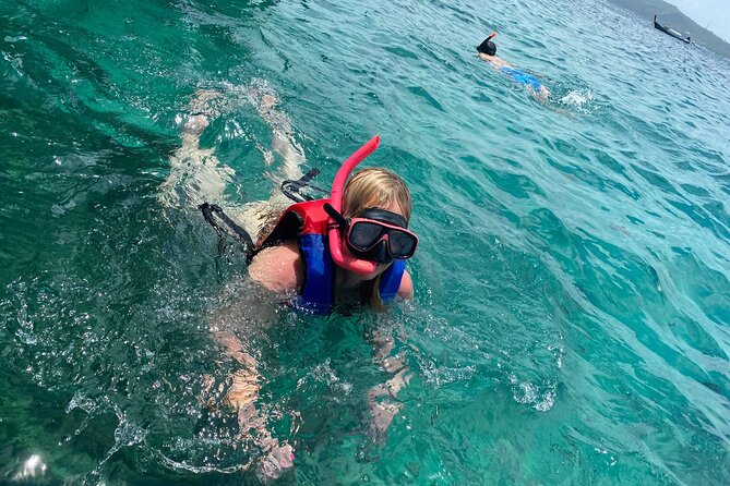 Phi Phi & Khai Islands Speedboat Tour from Phuket with Snorkeling - Phi Phi Don: swimming at Pileh Lagoon and lunch that actually helps