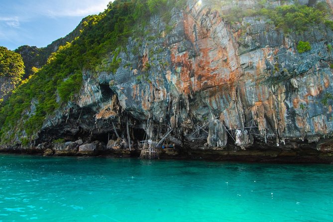 Phi Phi , Khai & Maya : Unforgettable Island Hopping by Speedboat - Viking Cave from the boat: quick, scenic, and easy to miss