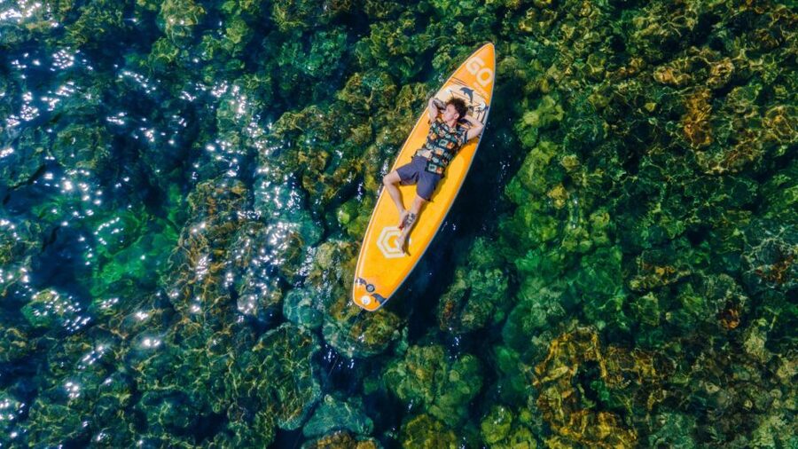 Phu Quoc: Discover Islands by speedboat & Hon Thom cable car - Island time by covered-canopy canoe: coral park, swings, and beach breaks