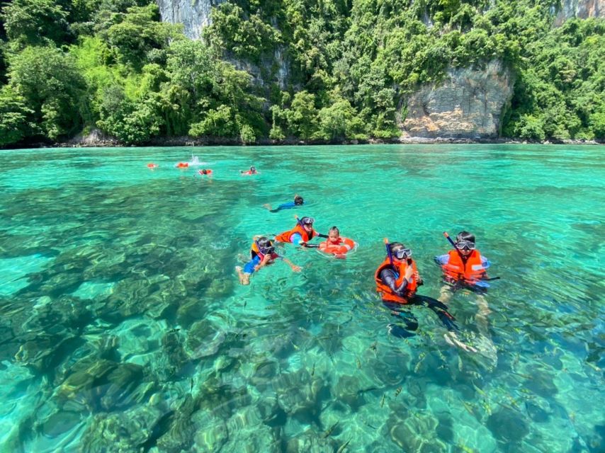 Phuket: Phi Phi & Khai Island Private Speedboat Charter Tour - The Koh Khai island experience: White sand, rock scenery, and swimming time