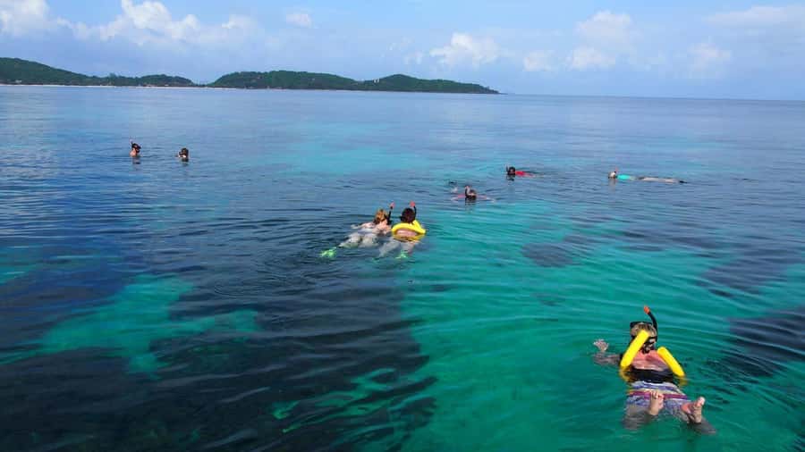 Phuket to Phi Phi Full-Day Luxury Speed Boat Charter - Pileh Lagoon: the swim stop framed by limestone cliffs