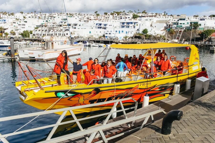 Puerto del Carmen: Dolphin-Watching Speedboat Tour with Swim - The fast-boat vibe leaving Puerto del Carmen