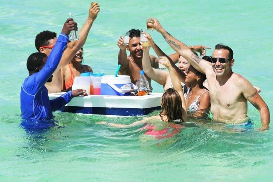 Punta Cana: Saona Island Speedboat and Catamaran Tour - The Blue Lagoon Natural Pool stop: shallow water, wading, and starfish sanctuary views