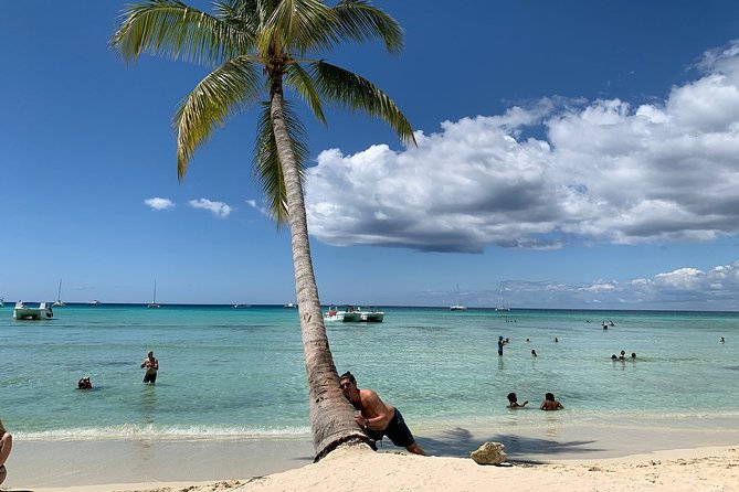 Saona Island Excursion by Catamaran and Speedboat (Full Day) - Live entertainment and the onboard mood