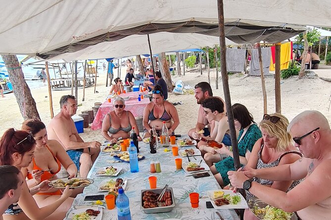 Snorkel with Dolphins, Lunch on Benitiers island, Speedboat - First Stop: Tamarin Bay Dolphin Watching and Dolphin Snorkeling
