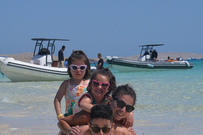 Speed Boat 4 Hours Swim Dolphin, Orange Island ,Snorkeling - On-board perks: drinks, fruit, and a crew that keeps things moving