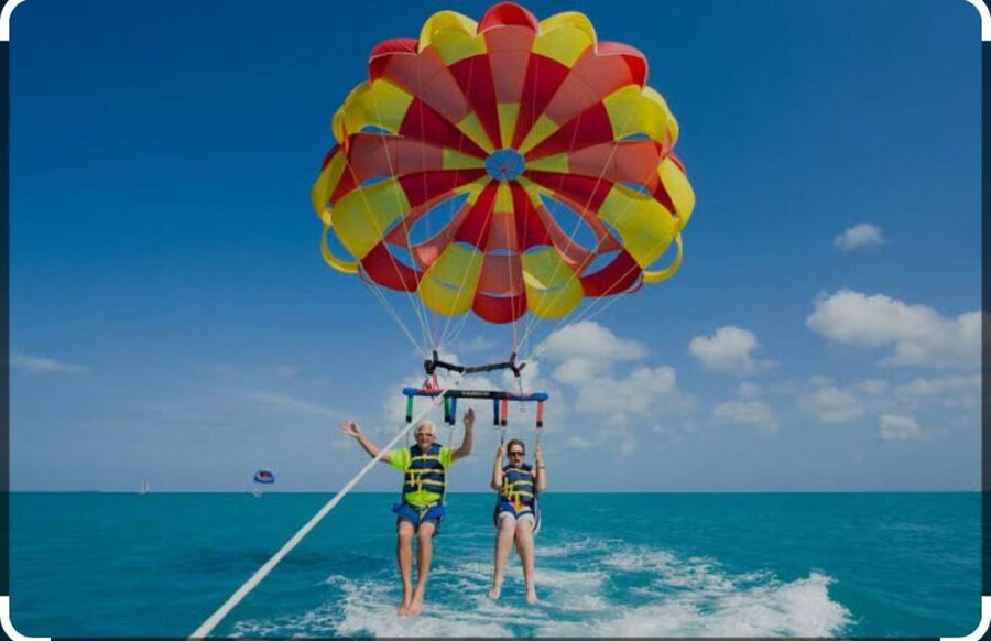 Speedboat,Parasailing, Snorkeling & Piece Of Paradise Island - From hotel pickup to a fast Red Sea departure