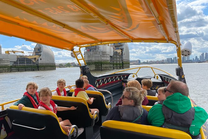 Speedboat 'THE THAMES BEAST' from Tower Millennium Pier - 40 mins - Onboard details that matter: live commentary, lifejackets, and ponchos