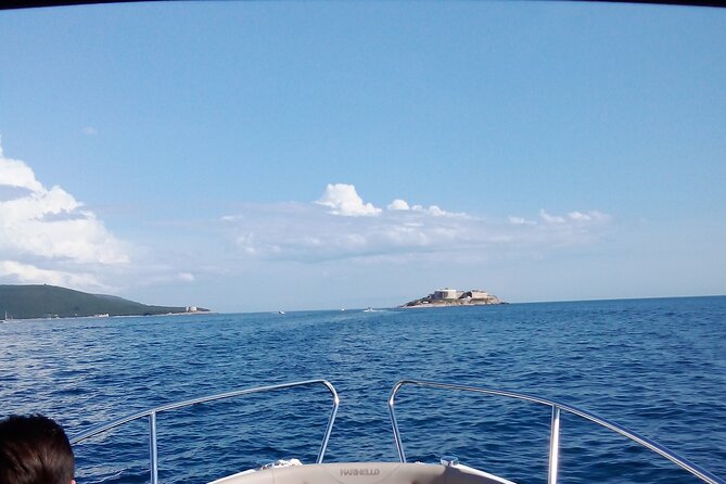 Speedboat Tour to Lady of the Rock, Mamula and Blue Cave Swim - Cruising the bay: Porto Montenegro views and the Ex-Submarine Tunnel