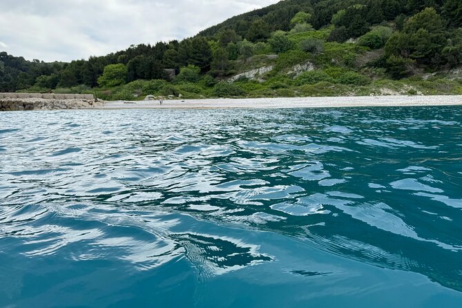 Speedboat Tour to Sazan Island, Haxhi Ali Cave and Marine Park - Stop 3: Karaburun–Sazan National Marine Park relaxation and traditional dishes