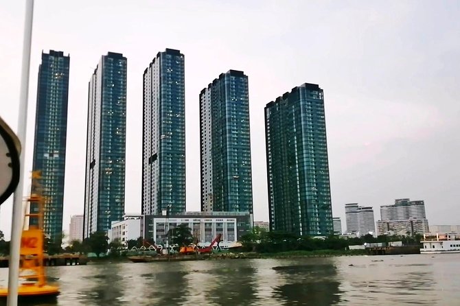 Sunset City-Dragon Floating Temple on River with LUXURY SPEEDBOAT - Pickup in District 1/3/4 and meeting Kelvin