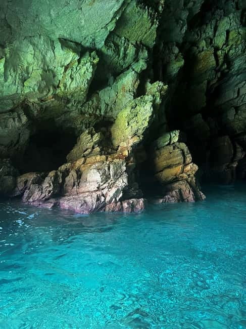 Vlore: Grama Bay & Karaburun Caves 8-Hour Speedboat Tour - Gjiri i Inglezit to Gjiri i Llovizit: history on one side, Blue Cave on the other