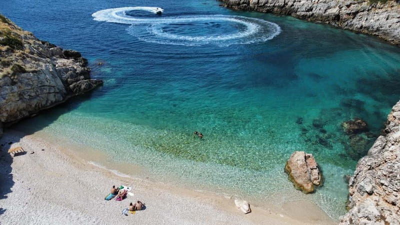 Vlore: Haxhi Ali Cave and Dafina Cave Speedboat Tour - Brisanit Bay and the Abandoned Communist-Era Unit: Sea + Land Texture